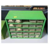 Metal unit with 24 drawers and gun parts: springs,