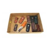 Lot, pocket knives in leather cases