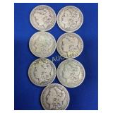 (7) 1900 O MORGAN SILVER DOLLARS