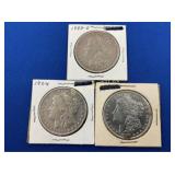 (3) MORGANS 1883 O, 1896, 1904 SILVER DOLLARS