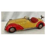 EARLY TIN LITHO GERMAN WINDUP CAR 4X10