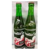 (2) FULL 10OZ MT. DEW BOTTLES W/ WILLIE