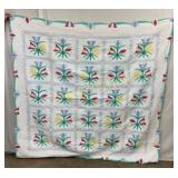 EARLY HANDMADE QUILT W/ FLOWERS