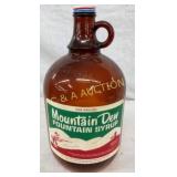 1G. AMBER MT. DEW JUG W PAPER LABEL