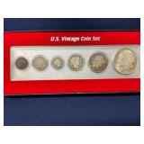 U.S. Vintage Coin Set Featuring Six Coins in Displ