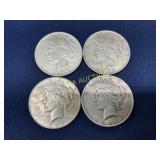 Four United States Peace Silver Dollars (1922 and