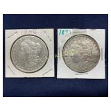 Two Morgan Silver Dollars, 1884 and 1879, in Cardb