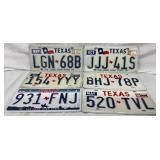 Five Texas License Plates with Various Designs