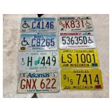 Eight License Plates from Iowa, Wisconsin, Guam, a