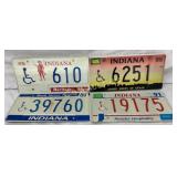 Four Indiana License Plates with Disability Symbol