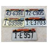 5 Nebraska License Plates with Various Designs and