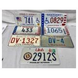 Seven Disabled Veteran License Plates from Various