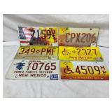 Six New Mexico License Plates with Various Designs