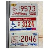 Three South Dakota Handicap License Plates