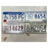 Four U.S. Handicap License Plates: Alabama, South