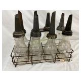 Eight Vintage Glass Bottles with Metal Spouts and