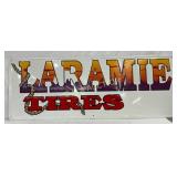 Emb. Laramie Tires' Metal Sign by Scioto Signs,