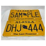 Two Alaska License Plates, Including One ï¿½Sampleï¿½