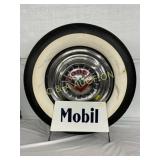 Mobil Tire Display with Dodge Hubcap