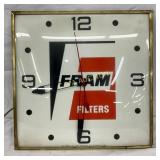 Fram Filters Advertising Clock by Pam Clock Inc.,