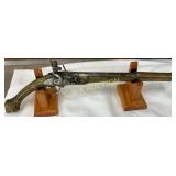 Antique-Style Flintlock Pistol with Ornately Embod