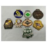 8 Metal Belt Buckles Featuring Logos and Themes