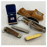 Various Pocket Knives, Belt Sheath, and Pepsi