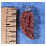 VINTAGE HAND CARVED PENDANT