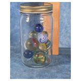 SMALL JAR OF MARBLES