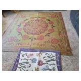 Oriental Floor Mat (tear shown) & Flower Rug