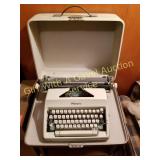 VINTAGE OLYMPIA TYPEWRITER WITH CASE