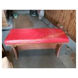 WOOD BENCH WITH RED CUSHION