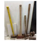 Group of Splitting Mauls, Axe, and Rusty Sledge Hammer Heads
