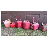 (6) Small Plastic Gas Cans, Some with Fuel, 1-2 1/2 Gallons