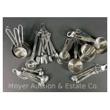 Group of Stainless Measuring Cups and Spoons