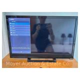 23" Vizio Television with Roku and Remotes, Model No. E231-B1