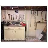 Contents of Workbench: Straight Edges, Levels, Saws, Hand Tools, Bench Grinder, Etc.