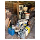 Group of Used Motor Oil and Empty 5 Gallon Oil Buckets