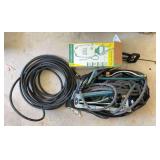 Group of Garden Hoses, Sprinklers and Pump Sprayers