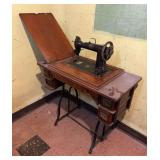 Wheeler & Wilson Sewing Machine in Oak Cabinet on Cast Iron Base, 32"x16"x29"h