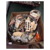 Tin of buttons , Scissors