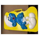 Smurf figurines and case