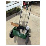 Scott’s drop seeder and electric chainsaw