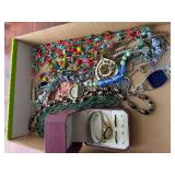 Flat of miscellaneous costume jewelry