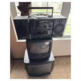 RCA stereo and 2 old style TVs