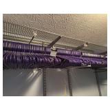 Lots of purple plastic hangers