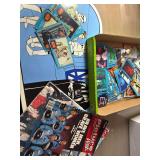 Pop culture items: Star Wars, E.T., Superman