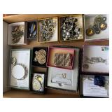 Flat of miscellaneous costume jewelry