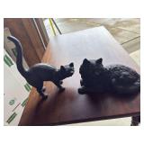 2 cast iron cats