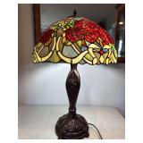 Stained glass style red rose lamp with decorative base. Lamp approximately 26' tall, shade approximately 18' wide